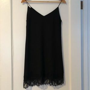 Black strappy sleeveless dress with lace trim